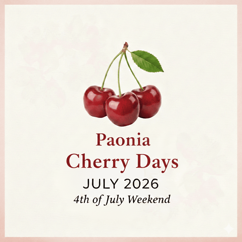 a promotional image with red cherries on a cream colored background and the word Paonia Cherry Days July 2026 4th of July Weekend