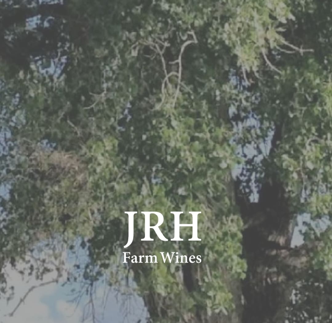 Tree in the background with JHR logo